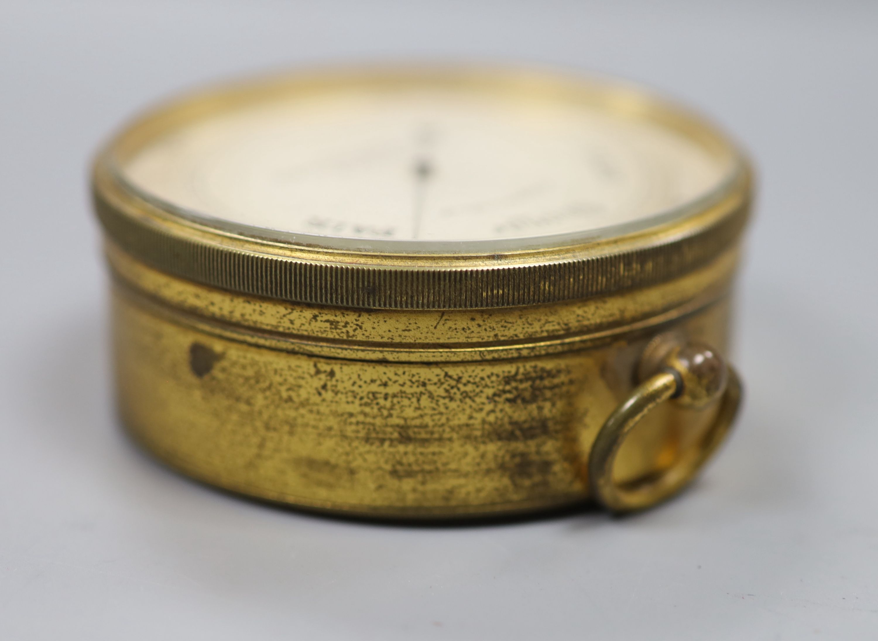 J, Hicks of London. A compensated travelling barometer, diameter 7.5cm